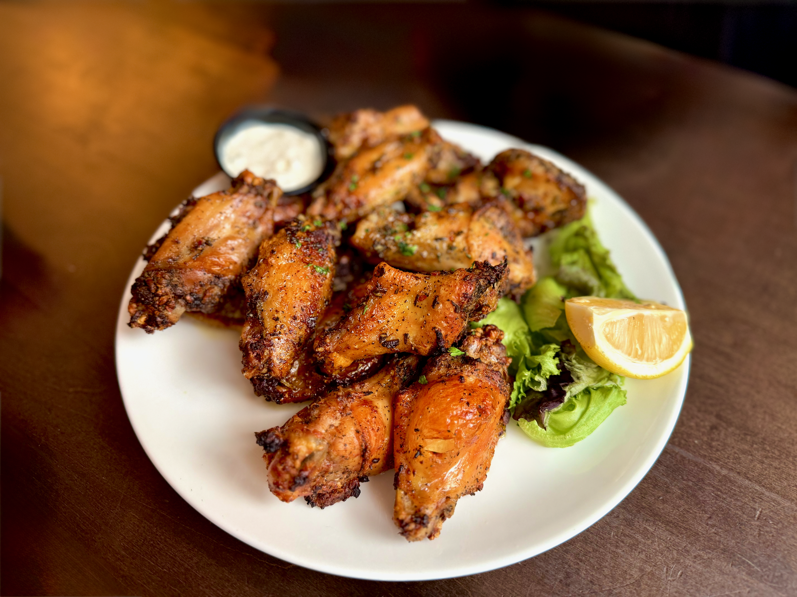 "Finger lickin' good," Photo of chicken wings by Diana Ludwick (c) 2026.